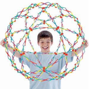 Boy smiling with a stretchy ball